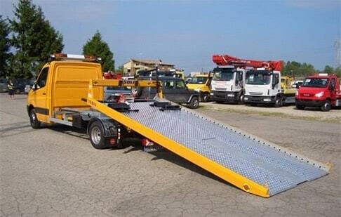 Фото эвакуатора с лебедкой и сдвижной платформой