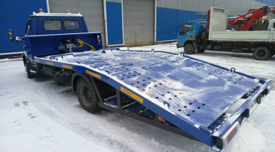 Фото эвакуатора с ломанной платформой